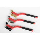Set of three brushes with red handles and black bristle heads on a white background