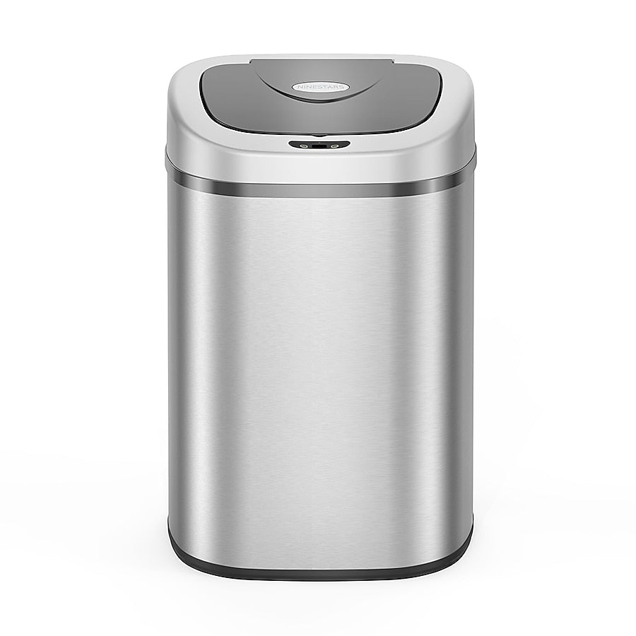 Stainless steel trash can with a silver lid on a white background