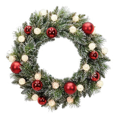 Christmas wreath with red and gold ornaments on a white background